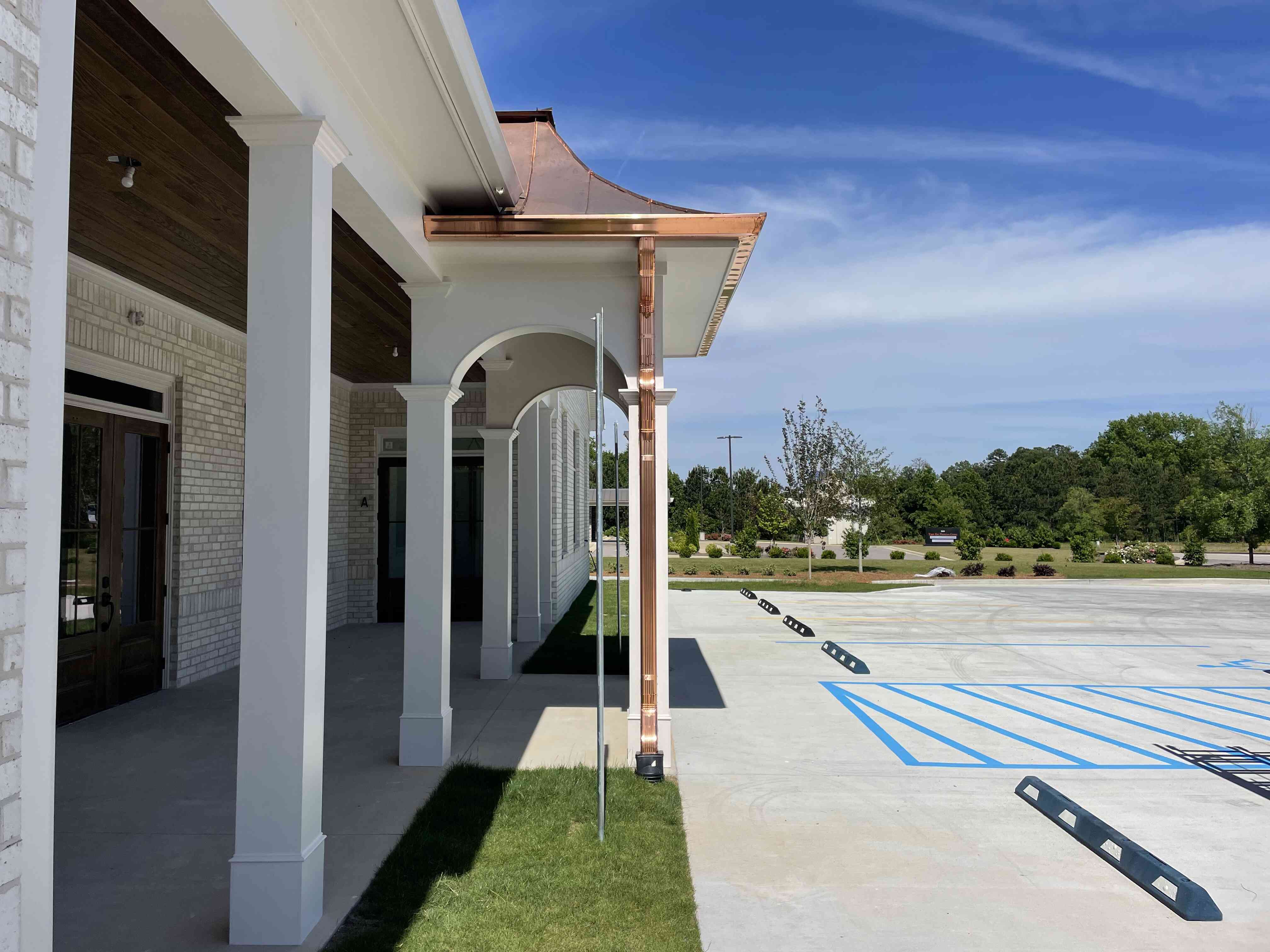 Copper Swoop and Hip Roof